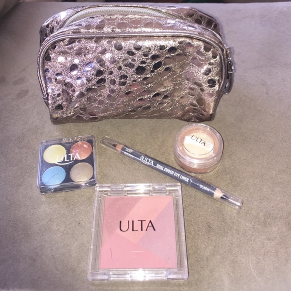 Cute lil makeup bag with makeup included